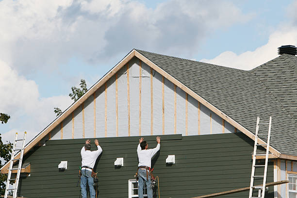 Professional Emergency Siding Repair technician working in Fredonia, NY